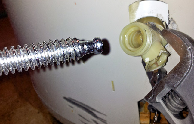 Plastic drain valve on Kenmore Power Miser 9 hot water heater, how to remove...